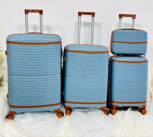 4 valises de voyage en polypropylène Solides, légères et au design moderne.Neuf jamais utilisé